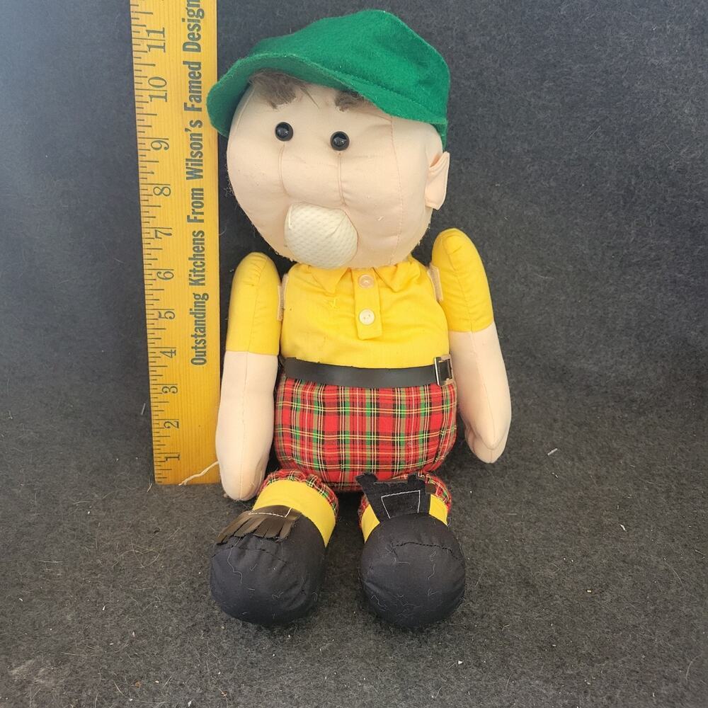 1989 Golfers tear apart stress doll; great gag gift for golfers